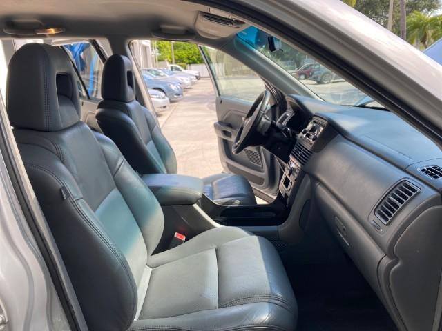 2004 Starlight Silver Metallic /Gray Honda Pilot EX-L 4WD LOW MILES 64,262 (2HKYF18574H) with an 3.5L SOHC PGM-FI 24-Valve VTEC V6 Engine engine, Automatic transmission, located at 4701 North Dixie Hwy, Pompano Beach, FL, 33064, (954) 422-2889, 26.240938, -80.123474 - OUR WEBPAGE FLORIDACARS1.COM HAS OVER 100 PHOTOS AND FREE CARFAX LINK 2004 Honda Pilot EX-L 4WD/AWD 4 Door Wagon/Sport Utility 3.5L V6 F SOHC Gasoline 22 MPG All Wheel Drive Features 4WD/AWD ABS Brakes Air Conditioning Alloy Wheels AM/FM Stereo Automatic Transmission Cassette Player CD Audio Cruise- Photo#12