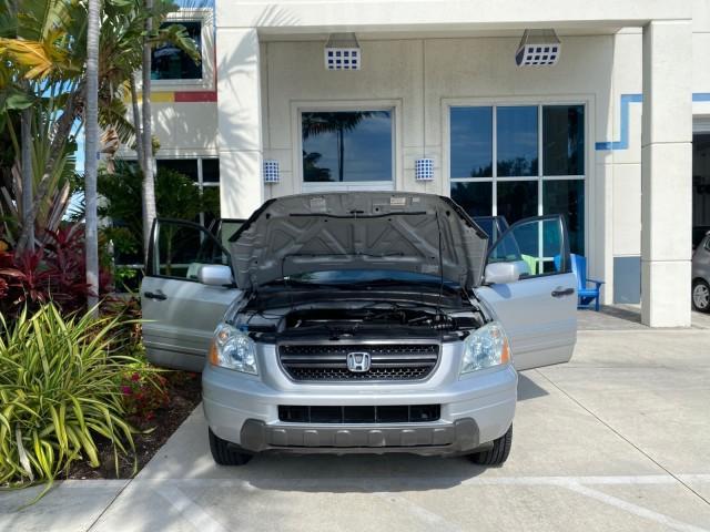 2004 Starlight Silver Metallic /Gray Honda Pilot EX-L 4WD LOW MILES 64,262 (2HKYF18574H) with an 3.5L SOHC PGM-FI 24-Valve VTEC V6 Engine engine, Automatic transmission, located at 4701 North Dixie Hwy, Pompano Beach, FL, 33064, (954) 422-2889, 26.240938, -80.123474 - OUR WEBPAGE FLORIDACARS1.COM HAS OVER 100 PHOTOS AND FREE CARFAX LINK 2004 Honda Pilot EX-L 4WD/AWD 4 Door Wagon/Sport Utility 3.5L V6 F SOHC Gasoline 22 MPG All Wheel Drive Features 4WD/AWD ABS Brakes Air Conditioning Alloy Wheels AM/FM Stereo Automatic Transmission Cassette Player CD Audio Cruise- Photo#16