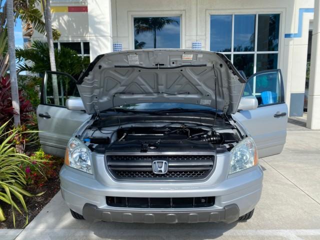 2004 Starlight Silver Metallic /Gray Honda Pilot EX-L 4WD LOW MILES 64,262 (2HKYF18574H) with an 3.5L SOHC PGM-FI 24-Valve VTEC V6 Engine engine, Automatic transmission, located at 4701 North Dixie Hwy, Pompano Beach, FL, 33064, (954) 422-2889, 26.240938, -80.123474 - OUR WEBPAGE FLORIDACARS1.COM HAS OVER 100 PHOTOS AND FREE CARFAX LINK 2004 Honda Pilot EX-L 4WD/AWD 4 Door Wagon/Sport Utility 3.5L V6 F SOHC Gasoline 22 MPG All Wheel Drive Features 4WD/AWD ABS Brakes Air Conditioning Alloy Wheels AM/FM Stereo Automatic Transmission Cassette Player CD Audio Cruise- Photo#17