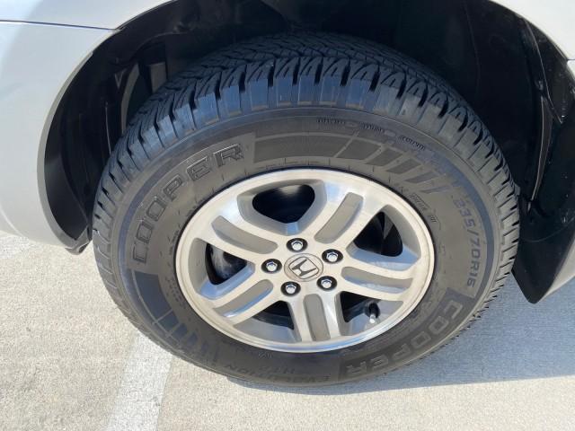 2004 Starlight Silver Metallic /Gray Honda Pilot EX-L 4WD LOW MILES 64,262 (2HKYF18574H) with an 3.5L SOHC PGM-FI 24-Valve VTEC V6 Engine engine, Automatic transmission, located at 4701 North Dixie Hwy, Pompano Beach, FL, 33064, (954) 422-2889, 26.240938, -80.123474 - OUR WEBPAGE FLORIDACARS1.COM HAS OVER 100 PHOTOS AND FREE CARFAX LINK 2004 Honda Pilot EX-L 4WD/AWD 4 Door Wagon/Sport Utility 3.5L V6 F SOHC Gasoline 22 MPG All Wheel Drive Features 4WD/AWD ABS Brakes Air Conditioning Alloy Wheels AM/FM Stereo Automatic Transmission Cassette Player CD Audio Cruise- Photo#21