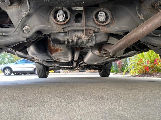 2004 Starlight Silver Metallic /Gray Honda Pilot EX-L 4WD LOW MILES 64,262 (2HKYF18574H) with an 3.5L SOHC PGM-FI 24-Valve VTEC V6 Engine engine, Automatic transmission, located at 4701 North Dixie Hwy, Pompano Beach, FL, 33064, (954) 422-2889, 26.240938, -80.123474 - OUR WEBPAGE FLORIDACARS1.COM HAS OVER 100 PHOTOS AND FREE CARFAX LINK 2004 Honda Pilot EX-L 4WD/AWD 4 Door Wagon/Sport Utility 3.5L V6 F SOHC Gasoline 22 MPG All Wheel Drive Features 4WD/AWD ABS Brakes Air Conditioning Alloy Wheels AM/FM Stereo Automatic Transmission Cassette Player CD Audio Cruise- Photo#24
