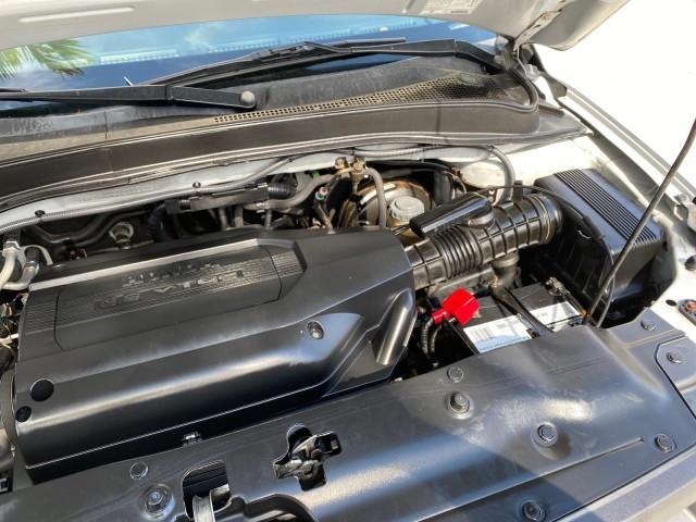 2004 Starlight Silver Metallic /Gray Honda Pilot EX-L 4WD LOW MILES 64,262 (2HKYF18574H) with an 3.5L SOHC PGM-FI 24-Valve VTEC V6 Engine engine, Automatic transmission, located at 4701 North Dixie Hwy, Pompano Beach, FL, 33064, (954) 422-2889, 26.240938, -80.123474 - OUR WEBPAGE FLORIDACARS1.COM HAS OVER 100 PHOTOS AND FREE CARFAX LINK 2004 Honda Pilot EX-L 4WD/AWD 4 Door Wagon/Sport Utility 3.5L V6 F SOHC Gasoline 22 MPG All Wheel Drive Features 4WD/AWD ABS Brakes Air Conditioning Alloy Wheels AM/FM Stereo Automatic Transmission Cassette Player CD Audio Cruise- Photo#19