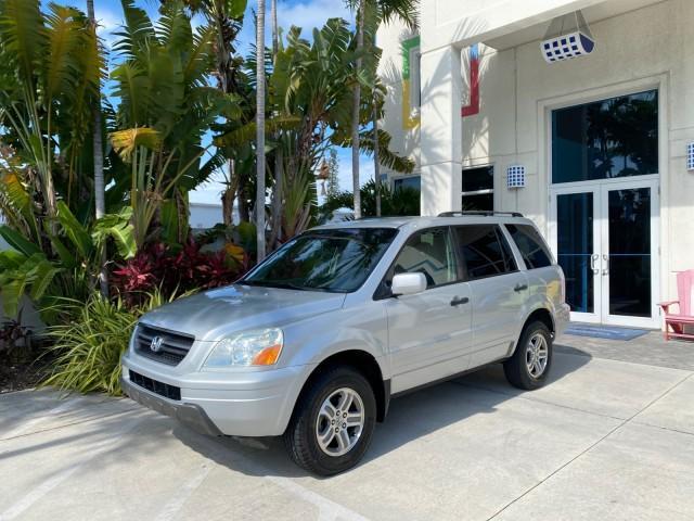 2004 Starlight Silver Metallic /Gray Honda Pilot EX-L 4WD LOW MILES 64,262 (2HKYF18574H) with an 3.5L SOHC PGM-FI 24-Valve VTEC V6 Engine engine, Automatic transmission, located at 4701 North Dixie Hwy, Pompano Beach, FL, 33064, (954) 422-2889, 26.240938, -80.123474 - OUR WEBPAGE FLORIDACARS1.COM HAS OVER 100 PHOTOS AND FREE CARFAX LINK 2004 Honda Pilot EX-L 4WD/AWD 4 Door Wagon/Sport Utility 3.5L V6 F SOHC Gasoline 22 MPG All Wheel Drive Features 4WD/AWD ABS Brakes Air Conditioning Alloy Wheels AM/FM Stereo Automatic Transmission Cassette Player CD Audio Cruise- Photo#27