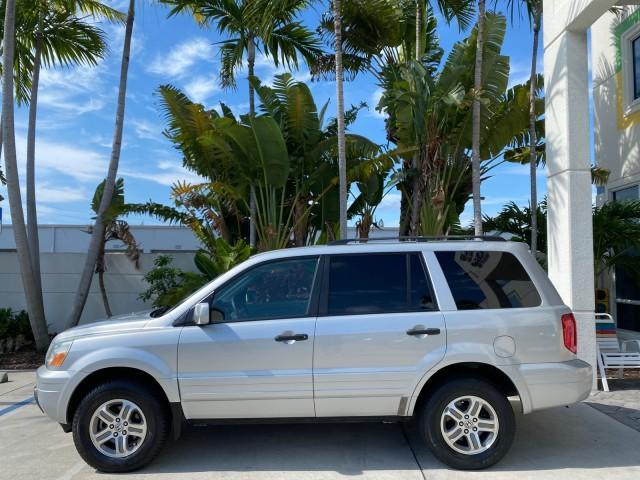 2004 Starlight Silver Metallic /Gray Honda Pilot EX-L 4WD LOW MILES 64,262 (2HKYF18574H) with an 3.5L SOHC PGM-FI 24-Valve VTEC V6 Engine engine, Automatic transmission, located at 4701 North Dixie Hwy, Pompano Beach, FL, 33064, (954) 422-2889, 26.240938, -80.123474 - OUR WEBPAGE FLORIDACARS1.COM HAS OVER 100 PHOTOS AND FREE CARFAX LINK 2004 Honda Pilot EX-L 4WD/AWD 4 Door Wagon/Sport Utility 3.5L V6 F SOHC Gasoline 22 MPG All Wheel Drive Features 4WD/AWD ABS Brakes Air Conditioning Alloy Wheels AM/FM Stereo Automatic Transmission Cassette Player CD Audio Cruise- Photo#30