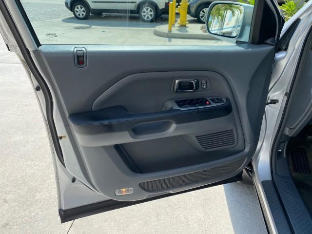 2004 Starlight Silver Metallic /Gray Honda Pilot EX-L 4WD LOW MILES 64,262 (2HKYF18574H) with an 3.5L SOHC PGM-FI 24-Valve VTEC V6 Engine engine, Automatic transmission, located at 4701 North Dixie Hwy, Pompano Beach, FL, 33064, (954) 422-2889, 26.240938, -80.123474 - OUR WEBPAGE FLORIDACARS1.COM HAS OVER 100 PHOTOS AND FREE CARFAX LINK 2004 Honda Pilot EX-L 4WD/AWD 4 Door Wagon/Sport Utility 3.5L V6 F SOHC Gasoline 22 MPG All Wheel Drive Features 4WD/AWD ABS Brakes Air Conditioning Alloy Wheels AM/FM Stereo Automatic Transmission Cassette Player CD Audio Cruise- Photo#39