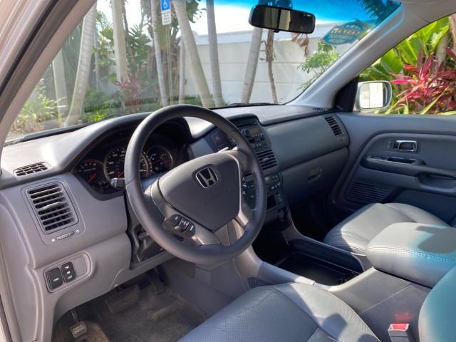 2004 Starlight Silver Metallic /Gray Honda Pilot EX-L 4WD LOW MILES 64,262 (2HKYF18574H) with an 3.5L SOHC PGM-FI 24-Valve VTEC V6 Engine engine, Automatic transmission, located at 4701 North Dixie Hwy, Pompano Beach, FL, 33064, (954) 422-2889, 26.240938, -80.123474 - OUR WEBPAGE FLORIDACARS1.COM HAS OVER 100 PHOTOS AND FREE CARFAX LINK 2004 Honda Pilot EX-L 4WD/AWD 4 Door Wagon/Sport Utility 3.5L V6 F SOHC Gasoline 22 MPG All Wheel Drive Features 4WD/AWD ABS Brakes Air Conditioning Alloy Wheels AM/FM Stereo Automatic Transmission Cassette Player CD Audio Cruise- Photo#44