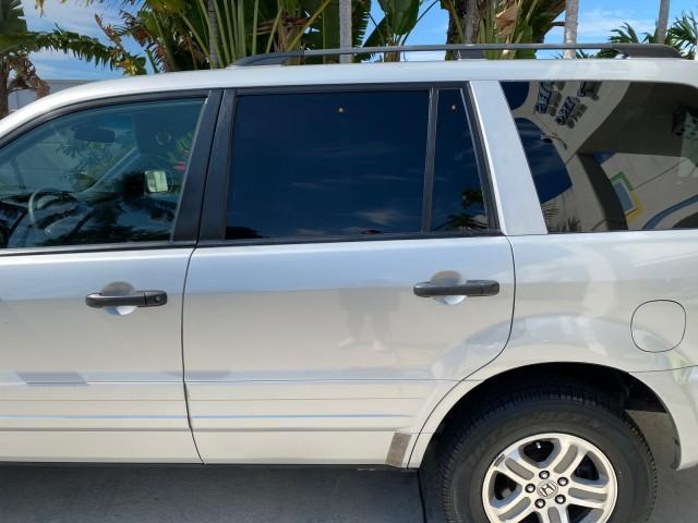 2004 Starlight Silver Metallic /Gray Honda Pilot EX-L 4WD LOW MILES 64,262 (2HKYF18574H) with an 3.5L SOHC PGM-FI 24-Valve VTEC V6 Engine engine, Automatic transmission, located at 4701 North Dixie Hwy, Pompano Beach, FL, 33064, (954) 422-2889, 26.240938, -80.123474 - OUR WEBPAGE FLORIDACARS1.COM HAS OVER 100 PHOTOS AND FREE CARFAX LINK 2004 Honda Pilot EX-L 4WD/AWD 4 Door Wagon/Sport Utility 3.5L V6 F SOHC Gasoline 22 MPG All Wheel Drive Features 4WD/AWD ABS Brakes Air Conditioning Alloy Wheels AM/FM Stereo Automatic Transmission Cassette Player CD Audio Cruise- Photo#67