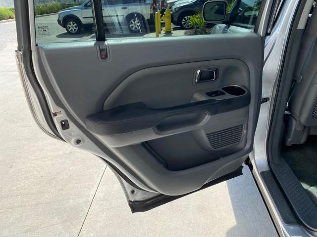 2004 Starlight Silver Metallic /Gray Honda Pilot EX-L 4WD LOW MILES 64,262 (2HKYF18574H) with an 3.5L SOHC PGM-FI 24-Valve VTEC V6 Engine engine, Automatic transmission, located at 4701 North Dixie Hwy, Pompano Beach, FL, 33064, (954) 422-2889, 26.240938, -80.123474 - OUR WEBPAGE FLORIDACARS1.COM HAS OVER 100 PHOTOS AND FREE CARFAX LINK 2004 Honda Pilot EX-L 4WD/AWD 4 Door Wagon/Sport Utility 3.5L V6 F SOHC Gasoline 22 MPG All Wheel Drive Features 4WD/AWD ABS Brakes Air Conditioning Alloy Wheels AM/FM Stereo Automatic Transmission Cassette Player CD Audio Cruise- Photo#69