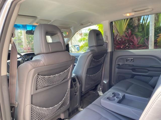 2004 Starlight Silver Metallic /Gray Honda Pilot EX-L 4WD LOW MILES 64,262 (2HKYF18574H) with an 3.5L SOHC PGM-FI 24-Valve VTEC V6 Engine engine, Automatic transmission, located at 4701 North Dixie Hwy, Pompano Beach, FL, 33064, (954) 422-2889, 26.240938, -80.123474 - OUR WEBPAGE FLORIDACARS1.COM HAS OVER 100 PHOTOS AND FREE CARFAX LINK 2004 Honda Pilot EX-L 4WD/AWD 4 Door Wagon/Sport Utility 3.5L V6 F SOHC Gasoline 22 MPG All Wheel Drive Features 4WD/AWD ABS Brakes Air Conditioning Alloy Wheels AM/FM Stereo Automatic Transmission Cassette Player CD Audio Cruise- Photo#75