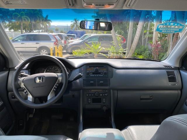 2004 Starlight Silver Metallic /Gray Honda Pilot EX-L 4WD LOW MILES 64,262 (2HKYF18574H) with an 3.5L SOHC PGM-FI 24-Valve VTEC V6 Engine engine, Automatic transmission, located at 4701 North Dixie Hwy, Pompano Beach, FL, 33064, (954) 422-2889, 26.240938, -80.123474 - OUR WEBPAGE FLORIDACARS1.COM HAS OVER 100 PHOTOS AND FREE CARFAX LINK 2004 Honda Pilot EX-L 4WD/AWD 4 Door Wagon/Sport Utility 3.5L V6 F SOHC Gasoline 22 MPG All Wheel Drive Features 4WD/AWD ABS Brakes Air Conditioning Alloy Wheels AM/FM Stereo Automatic Transmission Cassette Player CD Audio Cruise- Photo#77