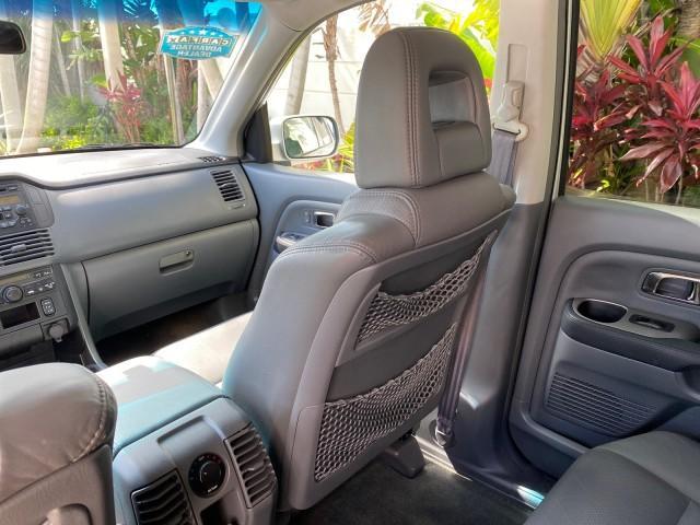 2004 Starlight Silver Metallic /Gray Honda Pilot EX-L 4WD LOW MILES 64,262 (2HKYF18574H) with an 3.5L SOHC PGM-FI 24-Valve VTEC V6 Engine engine, Automatic transmission, located at 4701 North Dixie Hwy, Pompano Beach, FL, 33064, (954) 422-2889, 26.240938, -80.123474 - OUR WEBPAGE FLORIDACARS1.COM HAS OVER 100 PHOTOS AND FREE CARFAX LINK 2004 Honda Pilot EX-L 4WD/AWD 4 Door Wagon/Sport Utility 3.5L V6 F SOHC Gasoline 22 MPG All Wheel Drive Features 4WD/AWD ABS Brakes Air Conditioning Alloy Wheels AM/FM Stereo Automatic Transmission Cassette Player CD Audio Cruise- Photo#78
