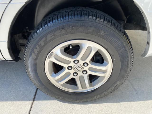 2004 Starlight Silver Metallic /Gray Honda Pilot EX-L 4WD LOW MILES 64,262 (2HKYF18574H) with an 3.5L SOHC PGM-FI 24-Valve VTEC V6 Engine engine, Automatic transmission, located at 4701 North Dixie Hwy, Pompano Beach, FL, 33064, (954) 422-2889, 26.240938, -80.123474 - OUR WEBPAGE FLORIDACARS1.COM HAS OVER 100 PHOTOS AND FREE CARFAX LINK 2004 Honda Pilot EX-L 4WD/AWD 4 Door Wagon/Sport Utility 3.5L V6 F SOHC Gasoline 22 MPG All Wheel Drive Features 4WD/AWD ABS Brakes Air Conditioning Alloy Wheels AM/FM Stereo Automatic Transmission Cassette Player CD Audio Cruise- Photo#87