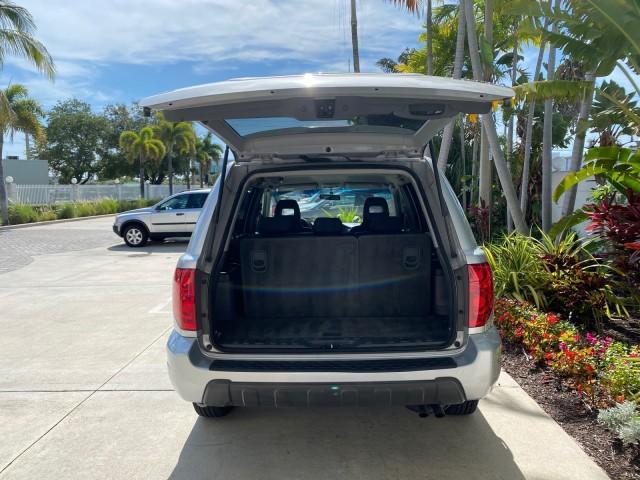2004 Starlight Silver Metallic /Gray Honda Pilot EX-L 4WD LOW MILES 64,262 (2HKYF18574H) with an 3.5L SOHC PGM-FI 24-Valve VTEC V6 Engine engine, Automatic transmission, located at 4701 North Dixie Hwy, Pompano Beach, FL, 33064, (954) 422-2889, 26.240938, -80.123474 - OUR WEBPAGE FLORIDACARS1.COM HAS OVER 100 PHOTOS AND FREE CARFAX LINK 2004 Honda Pilot EX-L 4WD/AWD 4 Door Wagon/Sport Utility 3.5L V6 F SOHC Gasoline 22 MPG All Wheel Drive Features 4WD/AWD ABS Brakes Air Conditioning Alloy Wheels AM/FM Stereo Automatic Transmission Cassette Player CD Audio Cruise- Photo#96