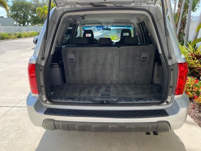 2004 Starlight Silver Metallic /Gray Honda Pilot EX-L 4WD LOW MILES 64,262 (2HKYF18574H) with an 3.5L SOHC PGM-FI 24-Valve VTEC V6 Engine engine, Automatic transmission, located at 4701 North Dixie Hwy, Pompano Beach, FL, 33064, (954) 422-2889, 26.240938, -80.123474 - OUR WEBPAGE FLORIDACARS1.COM HAS OVER 100 PHOTOS AND FREE CARFAX LINK 2004 Honda Pilot EX-L 4WD/AWD 4 Door Wagon/Sport Utility 3.5L V6 F SOHC Gasoline 22 MPG All Wheel Drive Features 4WD/AWD ABS Brakes Air Conditioning Alloy Wheels AM/FM Stereo Automatic Transmission Cassette Player CD Audio Cruise- Photo#97