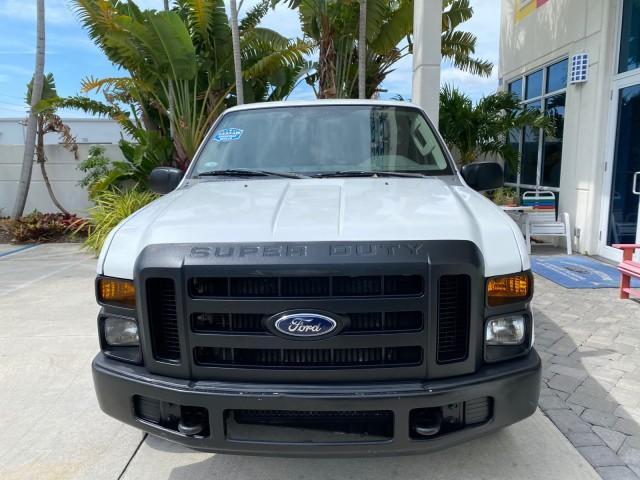 2008 Oxford White /Camel Ford Super Duty F-350 POWER STROKE TURBO DIESEL XL (1FTSF30R88E) with an 6.4L OHV V8 Turbo-Diesel Power Stroke Engine engine, Automatic transmission, located at 4701 North Dixie Hwy, Pompano Beach, FL, 33064, (954) 422-2889, 26.240938, -80.123474 - OUR WEBPAGE FLORIDACARS1.COM HAS OVER 100 PHOTOS AND FREE CARFAX LINK 2008 Ford F-350 Super Duty XL Turbo Diesel Pickup 6.4L V8 F Diesel Rear Wheel Drive Features ABS Brakes AM/FM Stereo Automatic Transmission Bed Liner Long Bed A/C Running Boards Turbo Diesel Engine Vinyl Seats 2008 Ford Super Duty- Photo#2