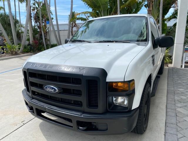 2008 Oxford White /Camel Ford Super Duty F-350 POWER STROKE TURBO DIESEL XL (1FTSF30R88E) with an 6.4L OHV V8 Turbo-Diesel Power Stroke Engine engine, Automatic transmission, located at 4701 North Dixie Hwy, Pompano Beach, FL, 33064, (954) 422-2889, 26.240938, -80.123474 - OUR WEBPAGE FLORIDACARS1.COM HAS OVER 100 PHOTOS AND FREE CARFAX LINK 2008 Ford F-350 Super Duty XL Turbo Diesel Pickup 6.4L V8 F Diesel Rear Wheel Drive Features ABS Brakes AM/FM Stereo Automatic Transmission Bed Liner Long Bed A/C Running Boards Turbo Diesel Engine Vinyl Seats 2008 Ford Super Duty- Photo#3