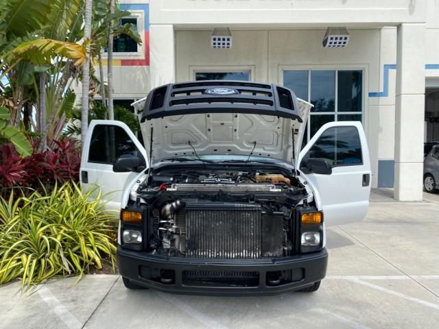 2008 Oxford White /Camel Ford Super Duty F-350 POWER STROKE TURBO DIESEL XL (1FTSF30R88E) with an 6.4L OHV V8 Turbo-Diesel Power Stroke Engine engine, Automatic transmission, located at 4701 North Dixie Hwy, Pompano Beach, FL, 33064, (954) 422-2889, 26.240938, -80.123474 - OUR WEBPAGE FLORIDACARS1.COM HAS OVER 100 PHOTOS AND FREE CARFAX LINK 2008 Ford F-350 Super Duty XL Turbo Diesel Pickup 6.4L V8 F Diesel Rear Wheel Drive Features ABS Brakes AM/FM Stereo Automatic Transmission Bed Liner Long Bed A/C Running Boards Turbo Diesel Engine Vinyl Seats 2008 Ford Super Duty- Photo#16