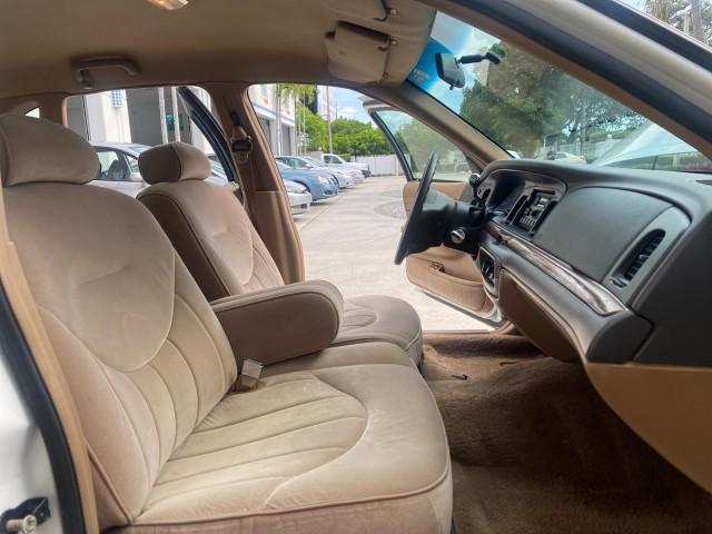 1995 White /Tan Ford Crown Victoria LOW MILES 43,331 (2FALP73W4SX) with an 4.6L 8-Cyl Engine engine, Automatic transmission, located at 4701 North Dixie Hwy, Pompano Beach, FL, 33064, (954) 422-2889, 26.240938, -80.123474 - OUR WEBPAGE FLORIDACARS1.COM HAS OVER 100 PHOTOS AND FREE CARFAX LINK 1995 Ford Crown Victoria Sedan 4 DR 4.6L V8 F SOHC 16V Gasoline Rear Wheel Drive Features Air Conditioning AM/FM Stereo Automatic Transmission Cassette Player Cloth Seats Cruise Control Power Locks Power Seat(s) Power Windows Rear- Photo#12