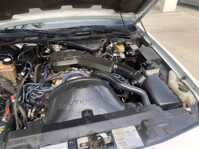 1995 White /Tan Ford Crown Victoria LOW MILES 43,331 (2FALP73W4SX) with an 4.6L 8-Cyl Engine engine, Automatic transmission, located at 4701 North Dixie Hwy, Pompano Beach, FL, 33064, (954) 422-2889, 26.240938, -80.123474 - OUR WEBPAGE FLORIDACARS1.COM HAS OVER 100 PHOTOS AND FREE CARFAX LINK 1995 Ford Crown Victoria Sedan 4 DR 4.6L V8 F SOHC 16V Gasoline Rear Wheel Drive Features Air Conditioning AM/FM Stereo Automatic Transmission Cassette Player Cloth Seats Cruise Control Power Locks Power Seat(s) Power Windows Rear- Photo#25