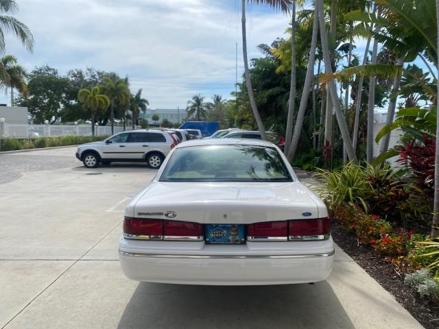 1995 White /Tan Ford Crown Victoria LOW MILES 43,331 (2FALP73W4SX) with an 4.6L 8-Cyl Engine engine, Automatic transmission, located at 4701 North Dixie Hwy, Pompano Beach, FL, 33064, (954) 422-2889, 26.240938, -80.123474 - OUR WEBPAGE FLORIDACARS1.COM HAS OVER 100 PHOTOS AND FREE CARFAX LINK 1995 Ford Crown Victoria Sedan 4 DR 4.6L V8 F SOHC 16V Gasoline Rear Wheel Drive Features Air Conditioning AM/FM Stereo Automatic Transmission Cassette Player Cloth Seats Cruise Control Power Locks Power Seat(s) Power Windows Rear- Photo#34