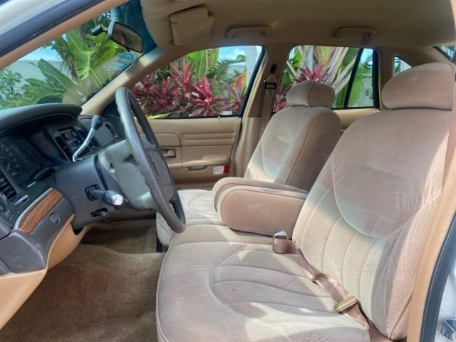 1995 White /Tan Ford Crown Victoria LOW MILES 43,331 (2FALP73W4SX) with an 4.6L 8-Cyl Engine engine, Automatic transmission, located at 4701 North Dixie Hwy, Pompano Beach, FL, 33064, (954) 422-2889, 26.240938, -80.123474 - OUR WEBPAGE FLORIDACARS1.COM HAS OVER 100 PHOTOS AND FREE CARFAX LINK 1995 Ford Crown Victoria Sedan 4 DR 4.6L V8 F SOHC 16V Gasoline Rear Wheel Drive Features Air Conditioning AM/FM Stereo Automatic Transmission Cassette Player Cloth Seats Cruise Control Power Locks Power Seat(s) Power Windows Rear- Photo#43