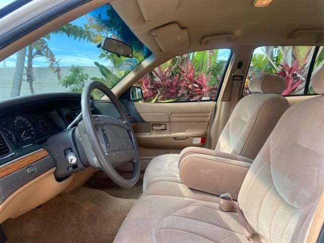 1995 White /Tan Ford Crown Victoria LOW MILES 43,331 (2FALP73W4SX) with an 4.6L 8-Cyl Engine engine, Automatic transmission, located at 4701 North Dixie Hwy, Pompano Beach, FL, 33064, (954) 422-2889, 26.240938, -80.123474 - OUR WEBPAGE FLORIDACARS1.COM HAS OVER 100 PHOTOS AND FREE CARFAX LINK 1995 Ford Crown Victoria Sedan 4 DR 4.6L V8 F SOHC 16V Gasoline Rear Wheel Drive Features Air Conditioning AM/FM Stereo Automatic Transmission Cassette Player Cloth Seats Cruise Control Power Locks Power Seat(s) Power Windows Rear- Photo#45