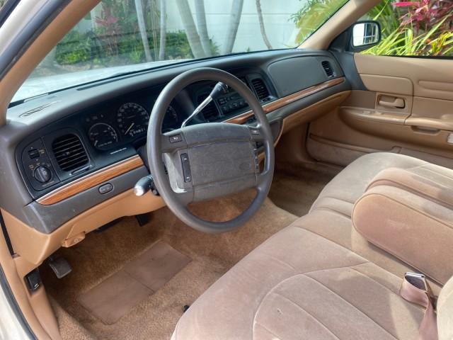 1995 White /Tan Ford Crown Victoria LOW MILES 43,331 (2FALP73W4SX) with an 4.6L 8-Cyl Engine engine, Automatic transmission, located at 4701 North Dixie Hwy, Pompano Beach, FL, 33064, (954) 422-2889, 26.240938, -80.123474 - OUR WEBPAGE FLORIDACARS1.COM HAS OVER 100 PHOTOS AND FREE CARFAX LINK 1995 Ford Crown Victoria Sedan 4 DR 4.6L V8 F SOHC 16V Gasoline Rear Wheel Drive Features Air Conditioning AM/FM Stereo Automatic Transmission Cassette Player Cloth Seats Cruise Control Power Locks Power Seat(s) Power Windows Rear- Photo#47