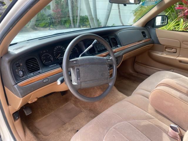 1995 White /Tan Ford Crown Victoria LOW MILES 43,331 (2FALP73W4SX) with an 4.6L 8-Cyl Engine engine, Automatic transmission, located at 4701 North Dixie Hwy, Pompano Beach, FL, 33064, (954) 422-2889, 26.240938, -80.123474 - OUR WEBPAGE FLORIDACARS1.COM HAS OVER 100 PHOTOS AND FREE CARFAX LINK 1995 Ford Crown Victoria Sedan 4 DR 4.6L V8 F SOHC 16V Gasoline Rear Wheel Drive Features Air Conditioning AM/FM Stereo Automatic Transmission Cassette Player Cloth Seats Cruise Control Power Locks Power Seat(s) Power Windows Rear- Photo#48