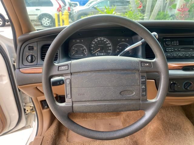 1995 White /Tan Ford Crown Victoria LOW MILES 43,331 (2FALP73W4SX) with an 4.6L 8-Cyl Engine engine, Automatic transmission, located at 4701 North Dixie Hwy, Pompano Beach, FL, 33064, (954) 422-2889, 26.240938, -80.123474 - OUR WEBPAGE FLORIDACARS1.COM HAS OVER 100 PHOTOS AND FREE CARFAX LINK 1995 Ford Crown Victoria Sedan 4 DR 4.6L V8 F SOHC 16V Gasoline Rear Wheel Drive Features Air Conditioning AM/FM Stereo Automatic Transmission Cassette Player Cloth Seats Cruise Control Power Locks Power Seat(s) Power Windows Rear- Photo#49