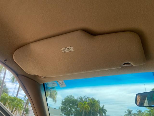 1995 White /Tan Ford Crown Victoria LOW MILES 43,331 (2FALP73W4SX) with an 4.6L 8-Cyl Engine engine, Automatic transmission, located at 4701 North Dixie Hwy, Pompano Beach, FL, 33064, (954) 422-2889, 26.240938, -80.123474 - OUR WEBPAGE FLORIDACARS1.COM HAS OVER 100 PHOTOS AND FREE CARFAX LINK 1995 Ford Crown Victoria Sedan 4 DR 4.6L V8 F SOHC 16V Gasoline Rear Wheel Drive Features Air Conditioning AM/FM Stereo Automatic Transmission Cassette Player Cloth Seats Cruise Control Power Locks Power Seat(s) Power Windows Rear- Photo#64