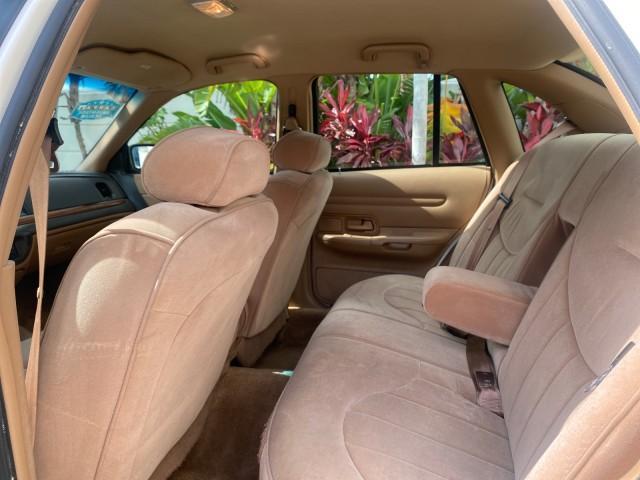 1995 White /Tan Ford Crown Victoria LOW MILES 43,331 (2FALP73W4SX) with an 4.6L 8-Cyl Engine engine, Automatic transmission, located at 4701 North Dixie Hwy, Pompano Beach, FL, 33064, (954) 422-2889, 26.240938, -80.123474 - OUR WEBPAGE FLORIDACARS1.COM HAS OVER 100 PHOTOS AND FREE CARFAX LINK 1995 Ford Crown Victoria Sedan 4 DR 4.6L V8 F SOHC 16V Gasoline Rear Wheel Drive Features Air Conditioning AM/FM Stereo Automatic Transmission Cassette Player Cloth Seats Cruise Control Power Locks Power Seat(s) Power Windows Rear- Photo#75