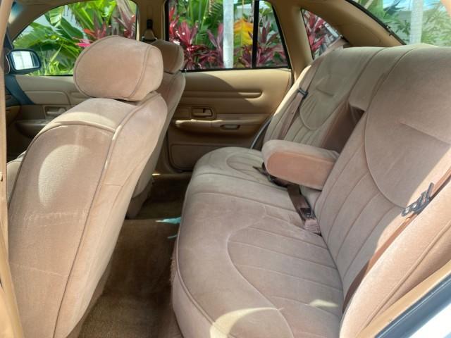 1995 White /Tan Ford Crown Victoria LOW MILES 43,331 (2FALP73W4SX) with an 4.6L 8-Cyl Engine engine, Automatic transmission, located at 4701 North Dixie Hwy, Pompano Beach, FL, 33064, (954) 422-2889, 26.240938, -80.123474 - OUR WEBPAGE FLORIDACARS1.COM HAS OVER 100 PHOTOS AND FREE CARFAX LINK 1995 Ford Crown Victoria Sedan 4 DR 4.6L V8 F SOHC 16V Gasoline Rear Wheel Drive Features Air Conditioning AM/FM Stereo Automatic Transmission Cassette Player Cloth Seats Cruise Control Power Locks Power Seat(s) Power Windows Rear- Photo#78