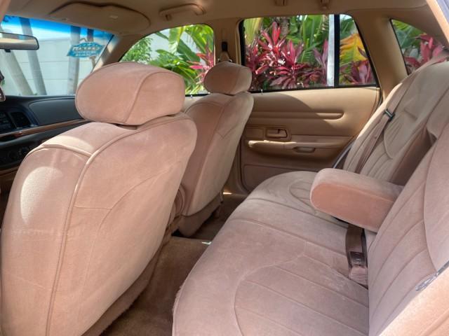1995 White /Tan Ford Crown Victoria LOW MILES 43,331 (2FALP73W4SX) with an 4.6L 8-Cyl Engine engine, Automatic transmission, located at 4701 North Dixie Hwy, Pompano Beach, FL, 33064, (954) 422-2889, 26.240938, -80.123474 - OUR WEBPAGE FLORIDACARS1.COM HAS OVER 100 PHOTOS AND FREE CARFAX LINK 1995 Ford Crown Victoria Sedan 4 DR 4.6L V8 F SOHC 16V Gasoline Rear Wheel Drive Features Air Conditioning AM/FM Stereo Automatic Transmission Cassette Player Cloth Seats Cruise Control Power Locks Power Seat(s) Power Windows Rear- Photo#80
