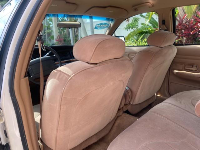 1995 White /Tan Ford Crown Victoria LOW MILES 43,331 (2FALP73W4SX) with an 4.6L 8-Cyl Engine engine, Automatic transmission, located at 4701 North Dixie Hwy, Pompano Beach, FL, 33064, (954) 422-2889, 26.240938, -80.123474 - OUR WEBPAGE FLORIDACARS1.COM HAS OVER 100 PHOTOS AND FREE CARFAX LINK 1995 Ford Crown Victoria Sedan 4 DR 4.6L V8 F SOHC 16V Gasoline Rear Wheel Drive Features Air Conditioning AM/FM Stereo Automatic Transmission Cassette Player Cloth Seats Cruise Control Power Locks Power Seat(s) Power Windows Rear- Photo#82