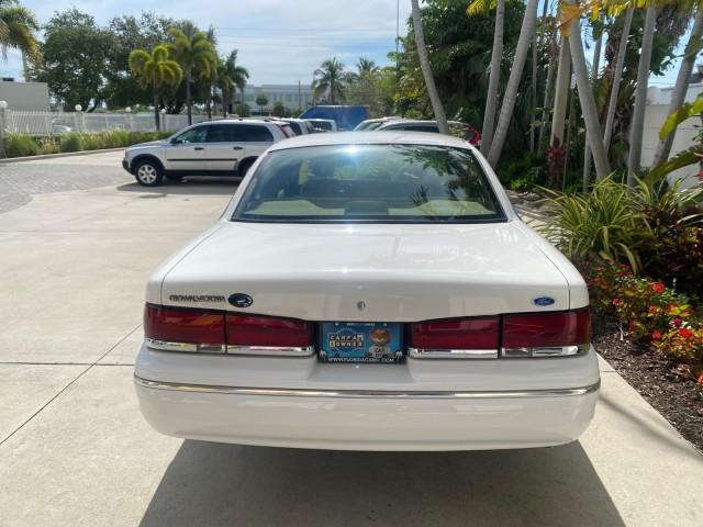 1995 White /Tan Ford Crown Victoria LOW MILES 43,331 (2FALP73W4SX) with an 4.6L 8-Cyl Engine engine, Automatic transmission, located at 4701 North Dixie Hwy, Pompano Beach, FL, 33064, (954) 422-2889, 26.240938, -80.123474 - OUR WEBPAGE FLORIDACARS1.COM HAS OVER 100 PHOTOS AND FREE CARFAX LINK 1995 Ford Crown Victoria Sedan 4 DR 4.6L V8 F SOHC 16V Gasoline Rear Wheel Drive Features Air Conditioning AM/FM Stereo Automatic Transmission Cassette Player Cloth Seats Cruise Control Power Locks Power Seat(s) Power Windows Rear- Photo#90