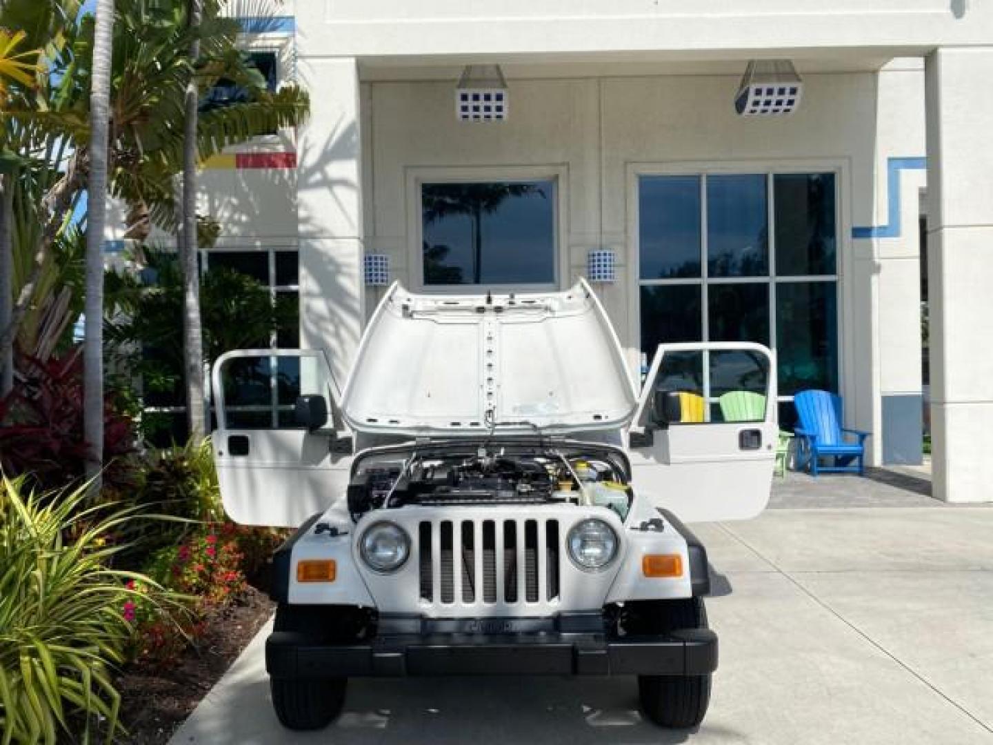 2005 Stone White /Dark Slate Gray Jeep Wrangler SE 4WD LOW MILES 29,371 1 OWNER (1J4FA29105P) with an 2.4L SMPI DOHC 16v 4-Cyl Engine engine, Manual transmission, located at 4701 North Dixie Hwy, Pompano Beach, FL, 33064, (954) 422-2889, 26.240938, -80.123474 - OUR WEBPAGE FLORIDACARS1.COM HAS OVER 100 PHOTOS AND FREE CARFAX LINK 2005 Jeep Wrangler SE 4WD 1 OWNER FACTORY ICE COLD AC 6 SPEED MANUAL Utility 2.4L I4 F Gasoline 21 MPG Rear Wheel Drive w/ 4X4 Features 4WD/AWD Air Conditioning Alloy Wheels AM/FM Stereo CD Audio Cloth Seats Manual Transmission So- Photo#16