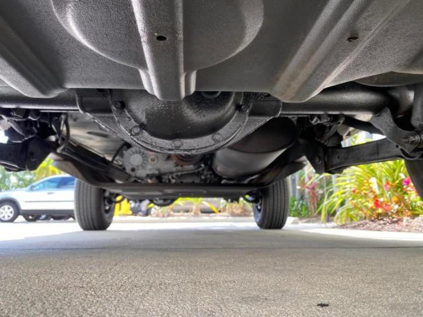 2005 Stone White /Dark Slate Gray Jeep Wrangler SE 4WD LOW MILES 29,371 1 OWNER (1J4FA29105P) with an 2.4L SMPI DOHC 16v 4-Cyl Engine engine, Manual transmission, located at 4701 North Dixie Hwy, Pompano Beach, FL, 33064, (954) 422-2889, 26.240938, -80.123474 - OUR WEBPAGE FLORIDACARS1.COM HAS OVER 100 PHOTOS AND FREE CARFAX LINK 2005 Jeep Wrangler SE 4WD 1 OWNER FACTORY ICE COLD AC 6 SPEED MANUAL Utility 2.4L I4 F Gasoline 21 MPG Rear Wheel Drive w/ 4X4 Features 4WD/AWD Air Conditioning Alloy Wheels AM/FM Stereo CD Audio Cloth Seats Manual Transmission So- Photo#22