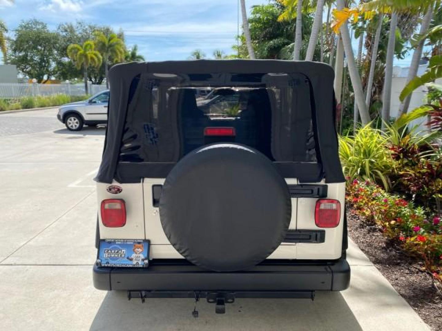2005 Stone White /Dark Slate Gray Jeep Wrangler SE 4WD LOW MILES 29,371 1 OWNER (1J4FA29105P) with an 2.4L SMPI DOHC 16v 4-Cyl Engine engine, Manual transmission, located at 4701 North Dixie Hwy, Pompano Beach, FL, 33064, (954) 422-2889, 26.240938, -80.123474 - OUR WEBPAGE FLORIDACARS1.COM HAS OVER 100 PHOTOS AND FREE CARFAX LINK 2005 Jeep Wrangler SE 4WD 1 OWNER FACTORY ICE COLD AC 6 SPEED MANUAL Utility 2.4L I4 F Gasoline 21 MPG Rear Wheel Drive w/ 4X4 Features 4WD/AWD Air Conditioning Alloy Wheels AM/FM Stereo CD Audio Cloth Seats Manual Transmission So- Photo#35