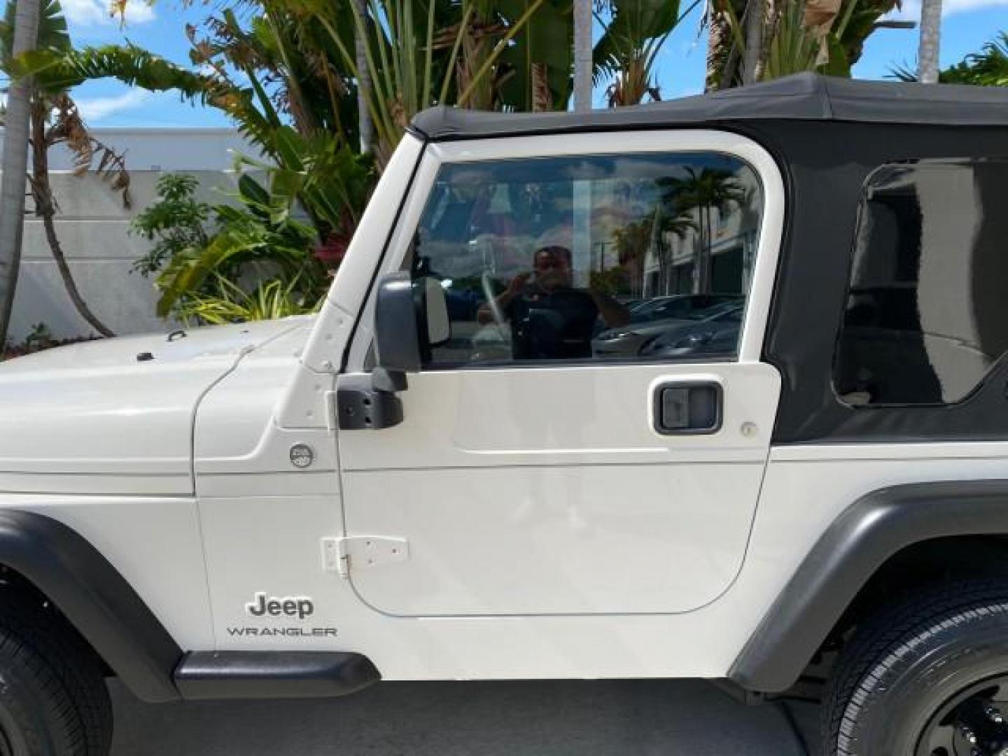 2005 Stone White /Dark Slate Gray Jeep Wrangler SE 4WD LOW MILES 29,371 1 OWNER (1J4FA29105P) with an 2.4L SMPI DOHC 16v 4-Cyl Engine engine, Manual transmission, located at 4701 North Dixie Hwy, Pompano Beach, FL, 33064, (954) 422-2889, 26.240938, -80.123474 - OUR WEBPAGE FLORIDACARS1.COM HAS OVER 100 PHOTOS AND FREE CARFAX LINK 2005 Jeep Wrangler SE 4WD 1 OWNER FACTORY ICE COLD AC 6 SPEED MANUAL Utility 2.4L I4 F Gasoline 21 MPG Rear Wheel Drive w/ 4X4 Features 4WD/AWD Air Conditioning Alloy Wheels AM/FM Stereo CD Audio Cloth Seats Manual Transmission So- Photo#36