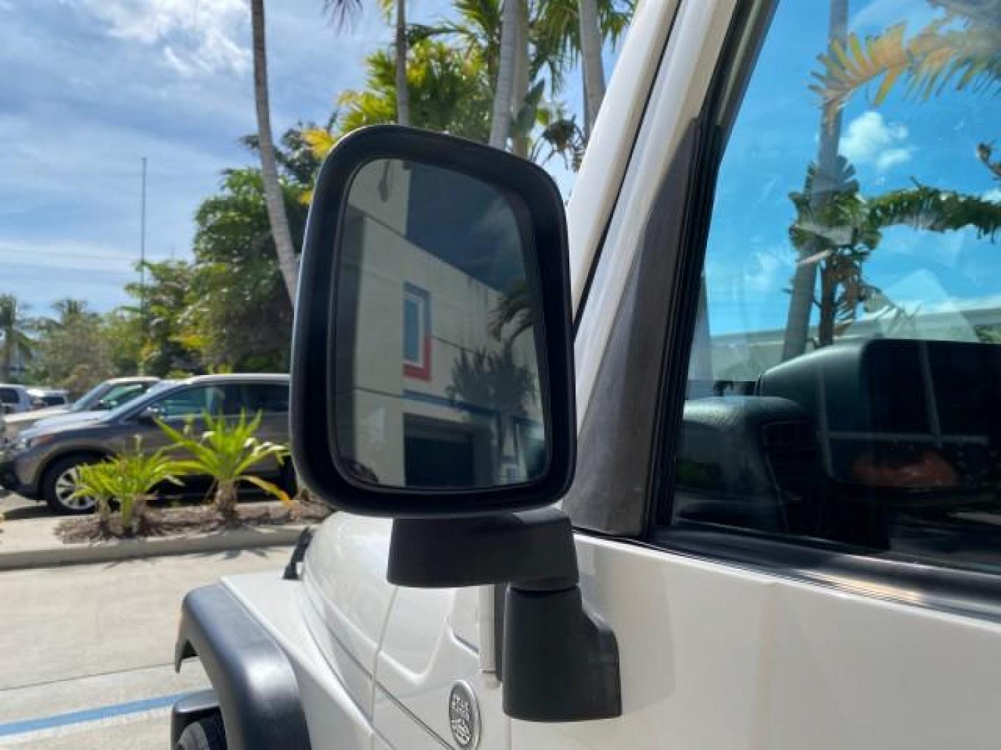 2005 Stone White /Dark Slate Gray Jeep Wrangler SE 4WD LOW MILES 29,371 1 OWNER (1J4FA29105P) with an 2.4L SMPI DOHC 16v 4-Cyl Engine engine, Manual transmission, located at 4701 North Dixie Hwy, Pompano Beach, FL, 33064, (954) 422-2889, 26.240938, -80.123474 - OUR WEBPAGE FLORIDACARS1.COM HAS OVER 100 PHOTOS AND FREE CARFAX LINK 2005 Jeep Wrangler SE 4WD 1 OWNER FACTORY ICE COLD AC 6 SPEED MANUAL Utility 2.4L I4 F Gasoline 21 MPG Rear Wheel Drive w/ 4X4 Features 4WD/AWD Air Conditioning Alloy Wheels AM/FM Stereo CD Audio Cloth Seats Manual Transmission So- Photo#38