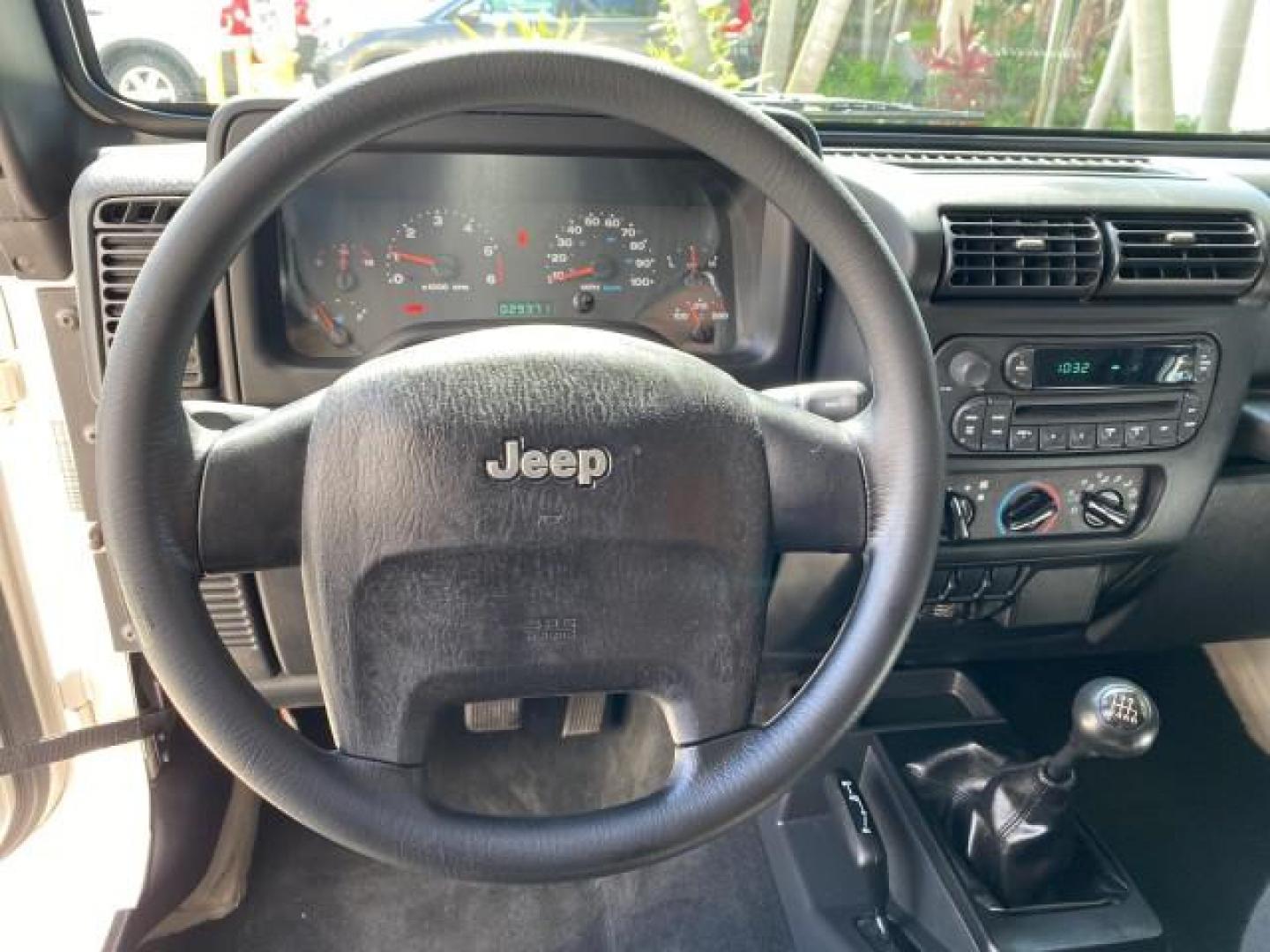 2005 Stone White /Dark Slate Gray Jeep Wrangler SE 4WD LOW MILES 29,371 1 OWNER (1J4FA29105P) with an 2.4L SMPI DOHC 16v 4-Cyl Engine engine, Manual transmission, located at 4701 North Dixie Hwy, Pompano Beach, FL, 33064, (954) 422-2889, 26.240938, -80.123474 - OUR WEBPAGE FLORIDACARS1.COM HAS OVER 100 PHOTOS AND FREE CARFAX LINK 2005 Jeep Wrangler SE 4WD 1 OWNER FACTORY ICE COLD AC 6 SPEED MANUAL Utility 2.4L I4 F Gasoline 21 MPG Rear Wheel Drive w/ 4X4 Features 4WD/AWD Air Conditioning Alloy Wheels AM/FM Stereo CD Audio Cloth Seats Manual Transmission So- Photo#49