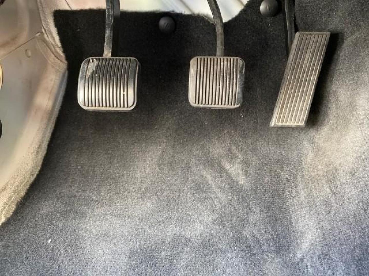 2005 Stone White /Dark Slate Gray Jeep Wrangler SE 4WD LOW MILES 29,371 1 OWNER (1J4FA29105P) with an 2.4L SMPI DOHC 16v 4-Cyl Engine engine, Manual transmission, located at 4701 North Dixie Hwy, Pompano Beach, FL, 33064, (954) 422-2889, 26.240938, -80.123474 - OUR WEBPAGE FLORIDACARS1.COM HAS OVER 100 PHOTOS AND FREE CARFAX LINK 2005 Jeep Wrangler SE 4WD 1 OWNER FACTORY ICE COLD AC 6 SPEED MANUAL Utility 2.4L I4 F Gasoline 21 MPG Rear Wheel Drive w/ 4X4 Features 4WD/AWD Air Conditioning Alloy Wheels AM/FM Stereo CD Audio Cloth Seats Manual Transmission So- Photo#52