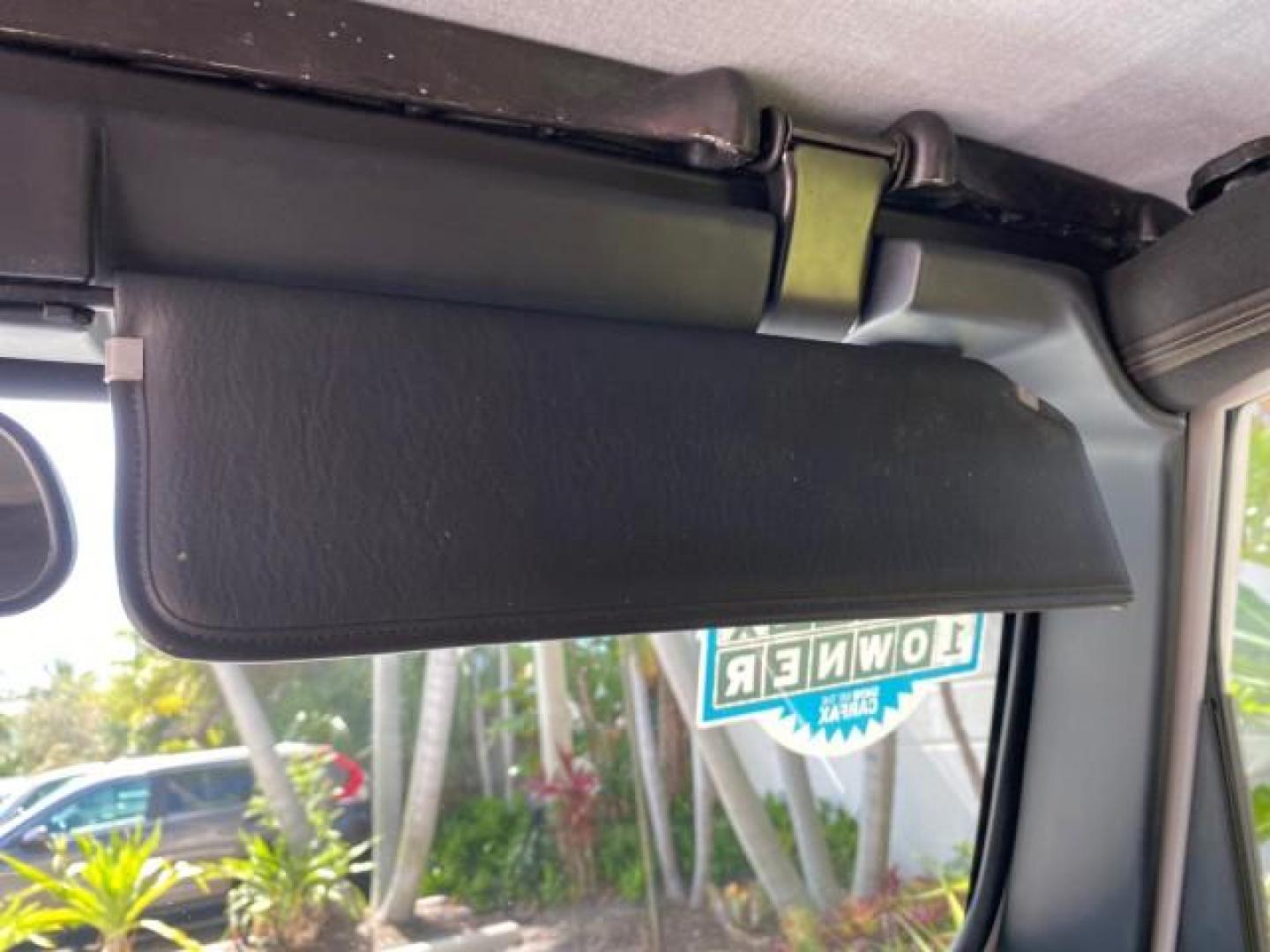 2005 Stone White /Dark Slate Gray Jeep Wrangler SE 4WD LOW MILES 29,371 1 OWNER (1J4FA29105P) with an 2.4L SMPI DOHC 16v 4-Cyl Engine engine, Manual transmission, located at 4701 North Dixie Hwy, Pompano Beach, FL, 33064, (954) 422-2889, 26.240938, -80.123474 - OUR WEBPAGE FLORIDACARS1.COM HAS OVER 100 PHOTOS AND FREE CARFAX LINK 2005 Jeep Wrangler SE 4WD 1 OWNER FACTORY ICE COLD AC 6 SPEED MANUAL Utility 2.4L I4 F Gasoline 21 MPG Rear Wheel Drive w/ 4X4 Features 4WD/AWD Air Conditioning Alloy Wheels AM/FM Stereo CD Audio Cloth Seats Manual Transmission So- Photo#68