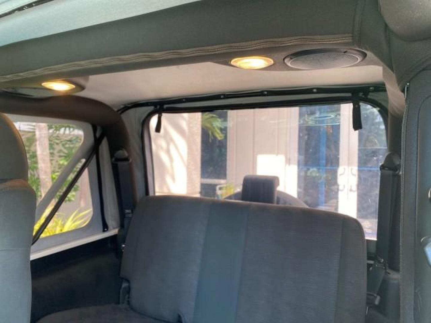2005 Stone White /Dark Slate Gray Jeep Wrangler SE 4WD LOW MILES 29,371 1 OWNER (1J4FA29105P) with an 2.4L SMPI DOHC 16v 4-Cyl Engine engine, Manual transmission, located at 4701 North Dixie Hwy, Pompano Beach, FL, 33064, (954) 422-2889, 26.240938, -80.123474 - OUR WEBPAGE FLORIDACARS1.COM HAS OVER 100 PHOTOS AND FREE CARFAX LINK 2005 Jeep Wrangler SE 4WD 1 OWNER FACTORY ICE COLD AC 6 SPEED MANUAL Utility 2.4L I4 F Gasoline 21 MPG Rear Wheel Drive w/ 4X4 Features 4WD/AWD Air Conditioning Alloy Wheels AM/FM Stereo CD Audio Cloth Seats Manual Transmission So- Photo#73