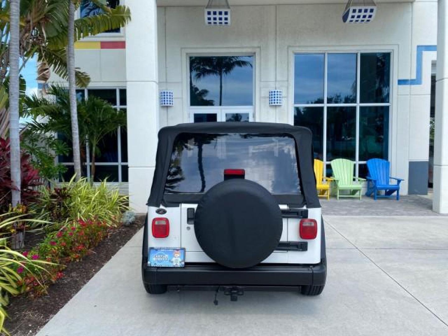 2005 Stone White /Dark Slate Gray Jeep Wrangler SE 4WD LOW MILES 29,371 1 OWNER (1J4FA29105P) with an 2.4L SMPI DOHC 16v 4-Cyl Engine engine, Manual transmission, located at 4701 North Dixie Hwy, Pompano Beach, FL, 33064, (954) 422-2889, 26.240938, -80.123474 - OUR WEBPAGE FLORIDACARS1.COM HAS OVER 100 PHOTOS AND FREE CARFAX LINK 2005 Jeep Wrangler SE 4WD 1 OWNER FACTORY ICE COLD AC 6 SPEED MANUAL Utility 2.4L I4 F Gasoline 21 MPG Rear Wheel Drive w/ 4X4 Features 4WD/AWD Air Conditioning Alloy Wheels AM/FM Stereo CD Audio Cloth Seats Manual Transmission So- Photo#85