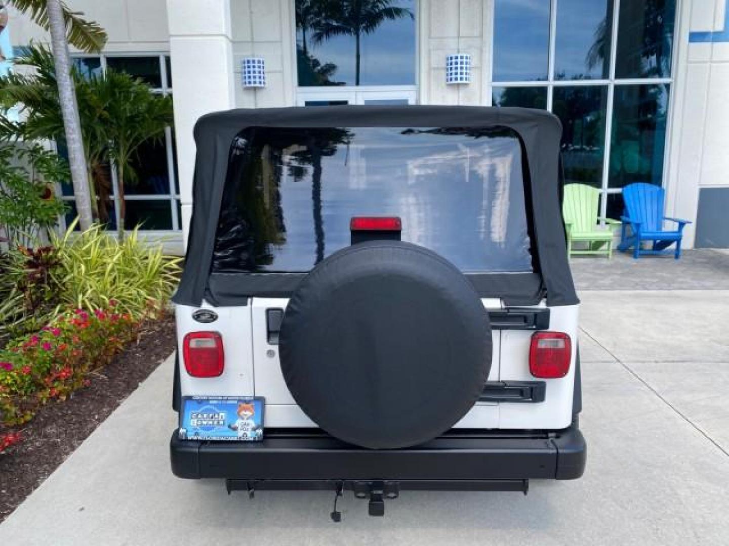 2005 Stone White /Dark Slate Gray Jeep Wrangler SE 4WD LOW MILES 29,371 1 OWNER (1J4FA29105P) with an 2.4L SMPI DOHC 16v 4-Cyl Engine engine, Manual transmission, located at 4701 North Dixie Hwy, Pompano Beach, FL, 33064, (954) 422-2889, 26.240938, -80.123474 - OUR WEBPAGE FLORIDACARS1.COM HAS OVER 100 PHOTOS AND FREE CARFAX LINK 2005 Jeep Wrangler SE 4WD 1 OWNER FACTORY ICE COLD AC 6 SPEED MANUAL Utility 2.4L I4 F Gasoline 21 MPG Rear Wheel Drive w/ 4X4 Features 4WD/AWD Air Conditioning Alloy Wheels AM/FM Stereo CD Audio Cloth Seats Manual Transmission So- Photo#86