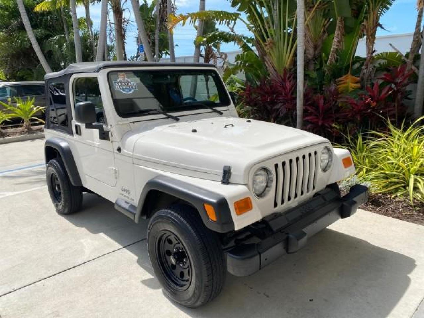 2005 Stone White /Dark Slate Gray Jeep Wrangler SE 4WD LOW MILES 29,371 1 OWNER (1J4FA29105P) with an 2.4L SMPI DOHC 16v 4-Cyl Engine engine, Manual transmission, located at 4701 North Dixie Hwy, Pompano Beach, FL, 33064, (954) 422-2889, 26.240938, -80.123474 - OUR WEBPAGE FLORIDACARS1.COM HAS OVER 100 PHOTOS AND FREE CARFAX LINK 2005 Jeep Wrangler SE 4WD 1 OWNER FACTORY ICE COLD AC 6 SPEED MANUAL Utility 2.4L I4 F Gasoline 21 MPG Rear Wheel Drive w/ 4X4 Features 4WD/AWD Air Conditioning Alloy Wheels AM/FM Stereo CD Audio Cloth Seats Manual Transmission So- Photo#92