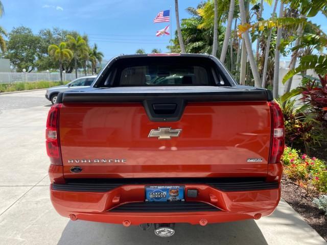 2009 Inferno Orange Metallic /Dark Cashmere/Light Cashmere Chevrolet Avalanche LT PU LOW MILES 58,696 (3GNEC22009G) with an 5.3L Vortec 1000 V8 SFI Flex-Fuel Engine engine, Automatic transmission, located at 4701 North Dixie Hwy, Pompano Beach, FL, 33064, (954) 422-2889, 26.240938, -80.123474 - OUR WEBPAGE FLORIDACARS1.COM HAS OVER 100 PHOTOS AND FREE CARFAX LINK 2009 Chevrolet Avalanche LT Sport Pickup 5.3L V8 F OHV 16V Flex Fuel 20 MPG Rear Wheel Drive Features 20 Inch Plus Wheels ABS Brakes Air Conditioning Alloy Wheels AM/FM Stereo Automatic Transmission Auxiliary Audio Input Bed Cover- Photo#35