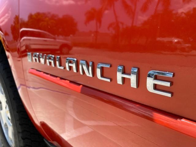 2009 Inferno Orange Metallic /Dark Cashmere/Light Cashmere Chevrolet Avalanche LT PU LOW MILES 58,696 (3GNEC22009G) with an 5.3L Vortec 1000 V8 SFI Flex-Fuel Engine engine, Automatic transmission, located at 4701 North Dixie Hwy, Pompano Beach, FL, 33064, (954) 422-2889, 26.240938, -80.123474 - OUR WEBPAGE FLORIDACARS1.COM HAS OVER 100 PHOTOS AND FREE CARFAX LINK 2009 Chevrolet Avalanche LT Sport Pickup 5.3L V8 F OHV 16V Flex Fuel 20 MPG Rear Wheel Drive Features 20 Inch Plus Wheels ABS Brakes Air Conditioning Alloy Wheels AM/FM Stereo Automatic Transmission Auxiliary Audio Input Bed Cover- Photo#41