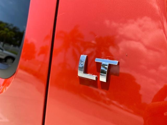 2009 Inferno Orange Metallic /Dark Cashmere/Light Cashmere Chevrolet Avalanche LT PU LOW MILES 58,696 (3GNEC22009G) with an 5.3L Vortec 1000 V8 SFI Flex-Fuel Engine engine, Automatic transmission, located at 4701 North Dixie Hwy, Pompano Beach, FL, 33064, (954) 422-2889, 26.240938, -80.123474 - OUR WEBPAGE FLORIDACARS1.COM HAS OVER 100 PHOTOS AND FREE CARFAX LINK 2009 Chevrolet Avalanche LT Sport Pickup 5.3L V8 F OHV 16V Flex Fuel 20 MPG Rear Wheel Drive Features 20 Inch Plus Wheels ABS Brakes Air Conditioning Alloy Wheels AM/FM Stereo Automatic Transmission Auxiliary Audio Input Bed Cover- Photo#87